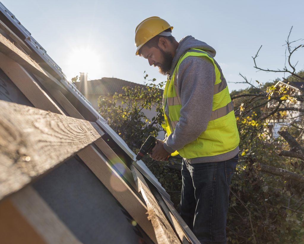 Expert Roof Repair Services | #1 Trusted Choice fixing a leaking asphalt shingle roof.